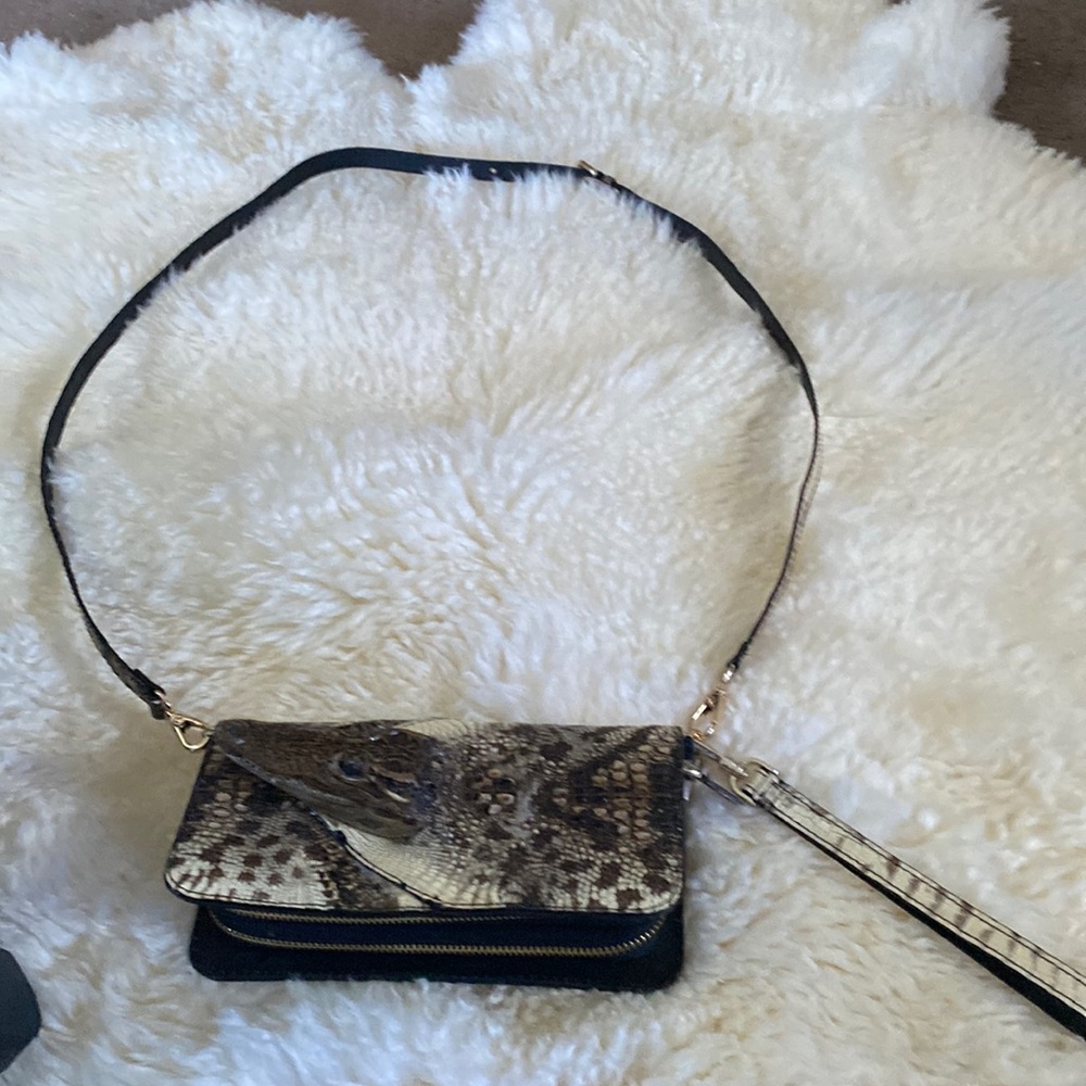 A Brand new Natural Hornback Alligator head clutch/ or shoulder bag.